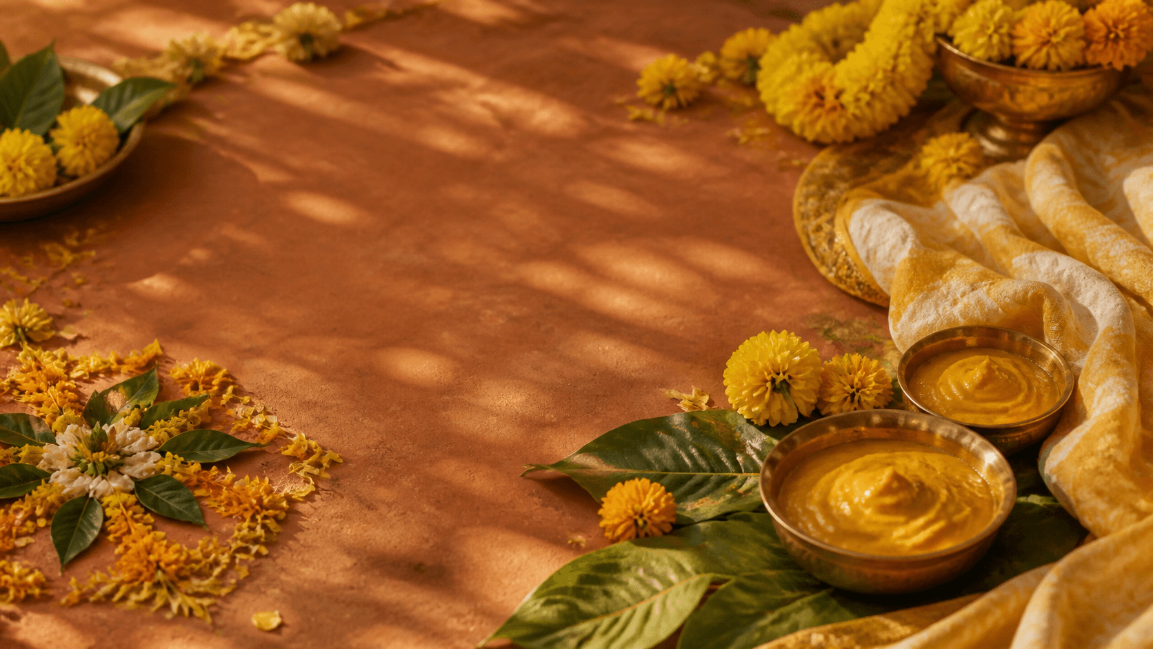 Turmeric, marigolds, and fabric prepared for the Haldi