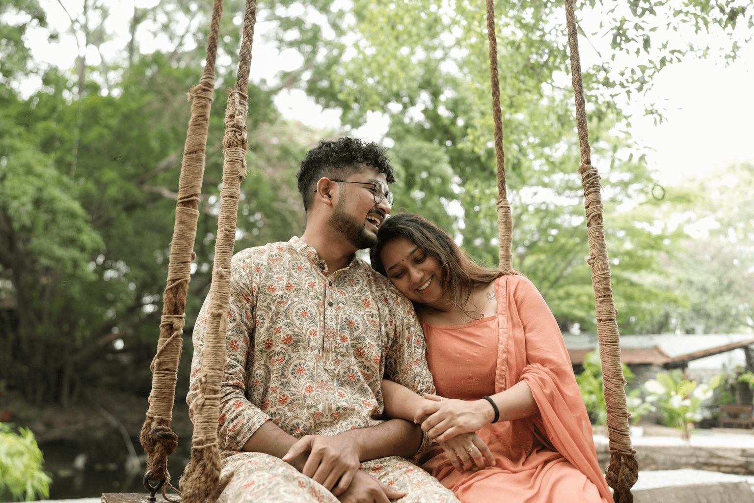 Rajshree and Deepesh sharing a quiet moment on a swing